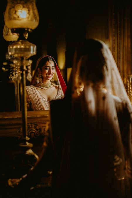 Photo of bridal portrait while looking in mirror