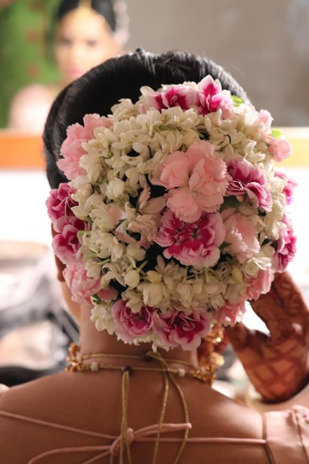 A floral bridal bun