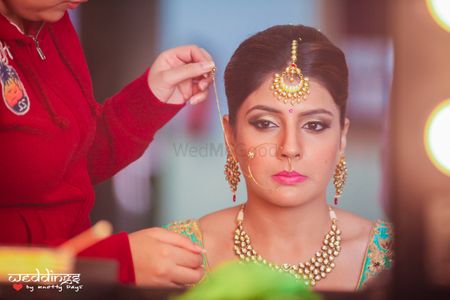 Photo of Bride Wearing Nath Shot