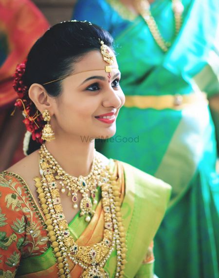 South Indian Bride in Lime Green Saree and Gold Jewelry