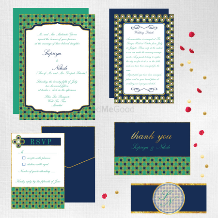 Photo of Jade green and navy blue invitation inserts