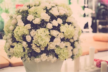 Photo of White Floral Table Centerpiece Decor