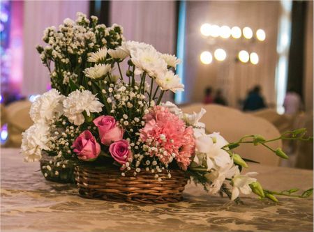 Photo of Pink and White Floral Basket Table Centerpiece