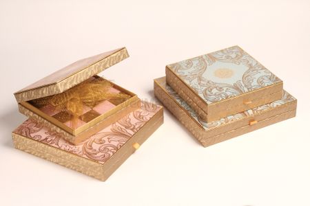 Photo of Pastel pink and aqua boxes