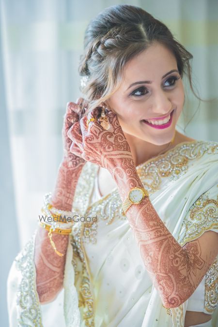 Bride Wearing Earrings Shot