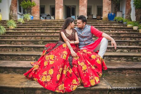 Photo of Red lehenga floral printed by Sabyasachi