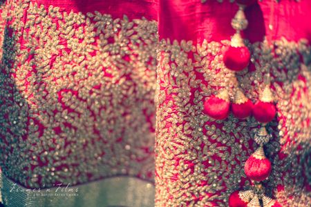 Photo of Gold Sequins Border and Red Pom Poms