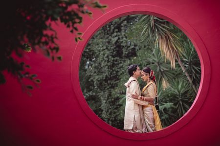 A candid shot of a south indian couple from their wedding day