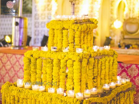 Photo of Genda Phool Floral Decor with Candles