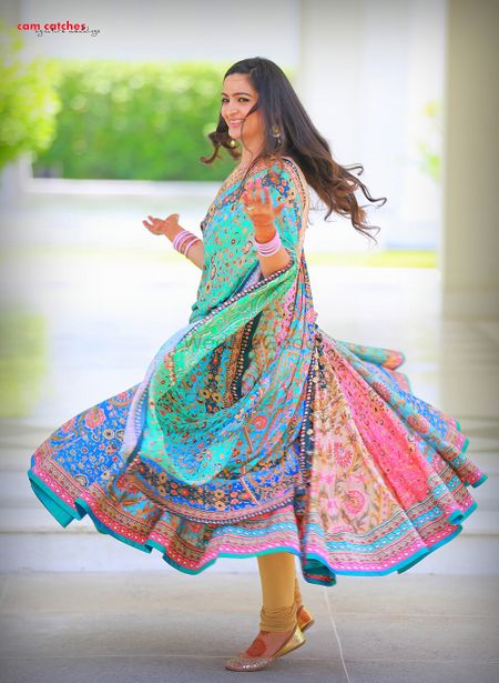 Photo of Blue, Green and Pink Printed Twirling Lehenga