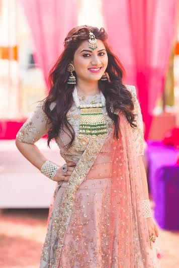 Photo of Pastel Pink Sequins Lehenga with Gold Necklace