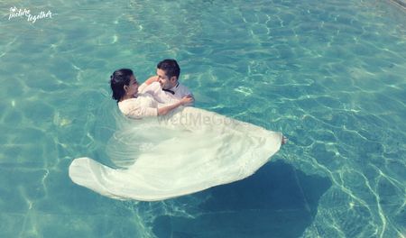 Photo of Pre Wedding Shoot with Couple in Swimming Pool