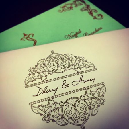 Photo of mint green and white invitation card