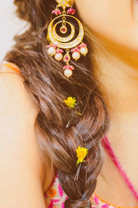 braid hairstyle with petals