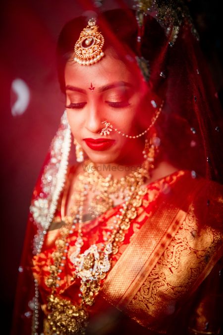 South Indian bride under a veil