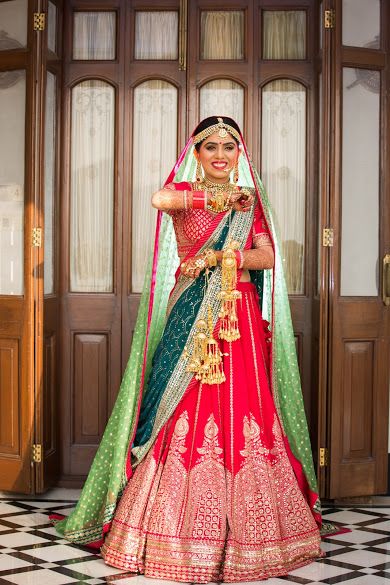 Photo of Red and green sabyasachi bridal lehenga