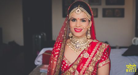 Bride in Red Dupatta and Diamond Jewelry