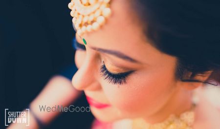 Gold Maangtikka with Gold Eye Makeup