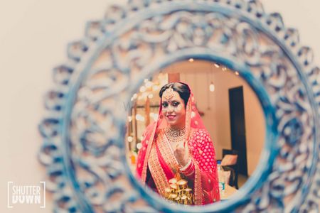 Hot Pink Bride Shot Through the Mirror