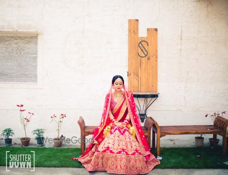 Bride Portrait in Hot Pink and Gold Lehenga