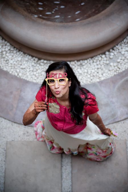 Bride with fun glasses prop