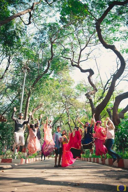 Fun bridesmaid and groomsmen photo