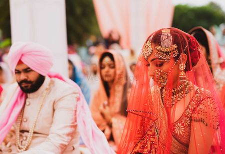 Sikh bride in warm hued outfit