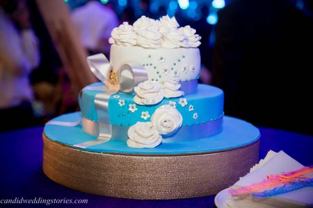 3 Tier Blue and White Wedding Cake with Florals