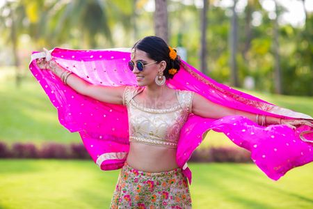 Sister of the Bride Posing in Pink and Gold Lehenga