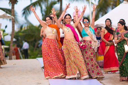 Bridesmaids Posing with Hands in the Air