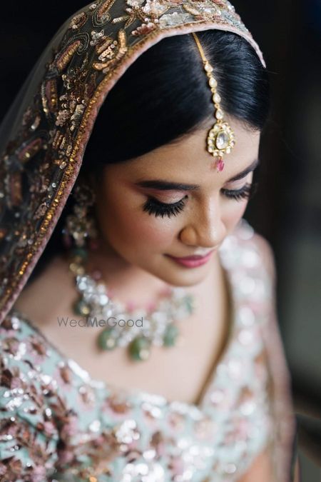 Dainty maang tikka for minimalist brides.