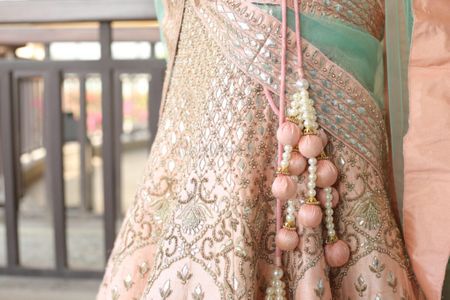 Light Pink Lehenga with Silver and Pink Ball Latkans