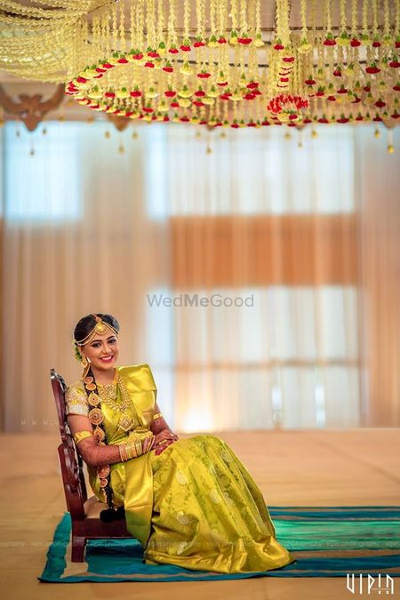 Photo of South Indian Bride Wearing Light Green Kanjivaram