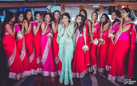 Bride with Matching Bridesmaids Wearing Pink Saris