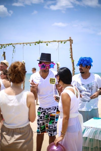 Fun Beach Wedding Party Photo with Props