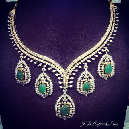 diamonds and emerald necklace with oval emerald drops