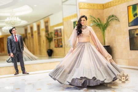 Light Grey Shimmery Lehenga with Pale Pink Cape
