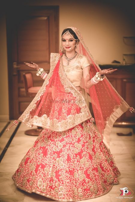 Photo of Peach and Gold Lehenga with Floral Zardozi Work