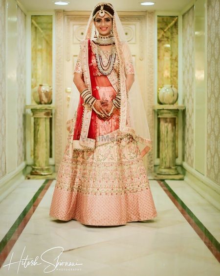 Photo of Bride in light pink lehenga