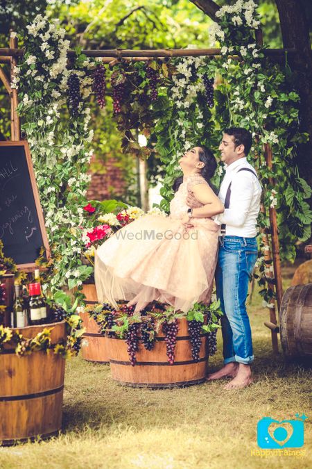 Couple Stomping Grapes in Vineyard Theme Shoot
