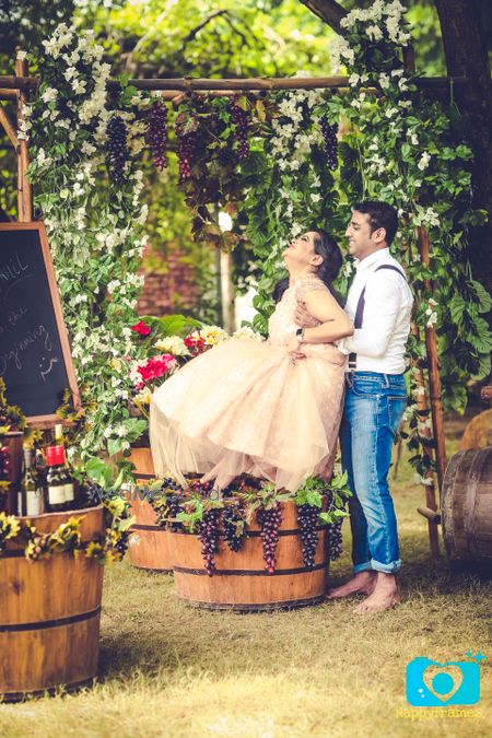 Couple Stomping Grapes in Vineyard Theme Shoot