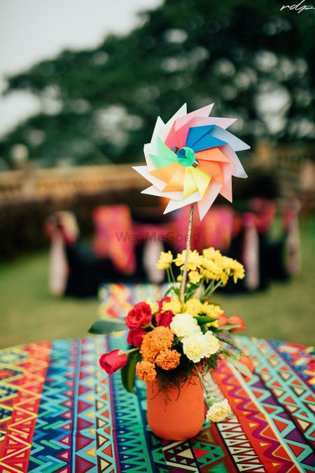 Floral centrepiece with pinwheel.