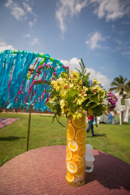 Pineapple floral vase used as a table centrepiece.