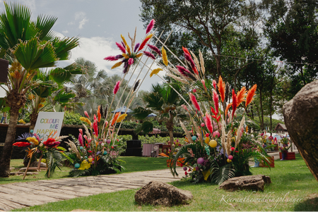 Entrance decor done with colourful pampas.