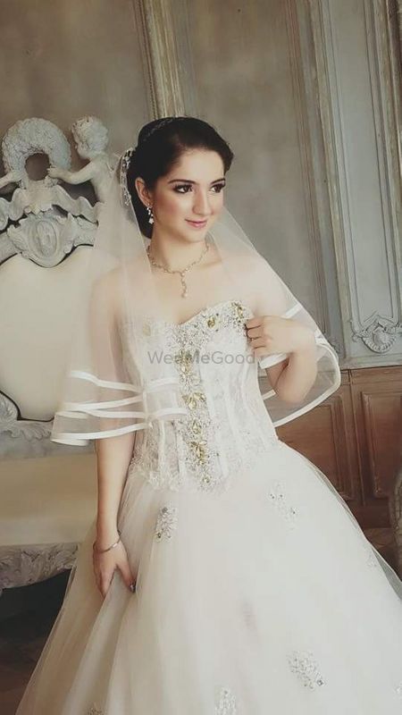 Bride in Christian Bridal Gown with Stone Work