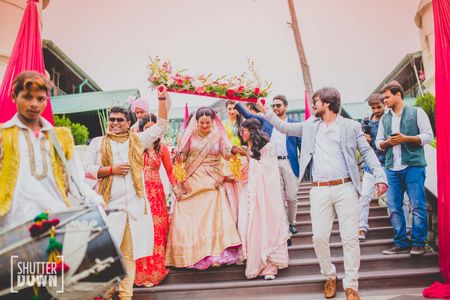 Fun Bridal Entry Under Rustic Phoolon ki Chadar