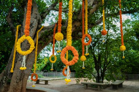 Tree decor with genda phool strings.