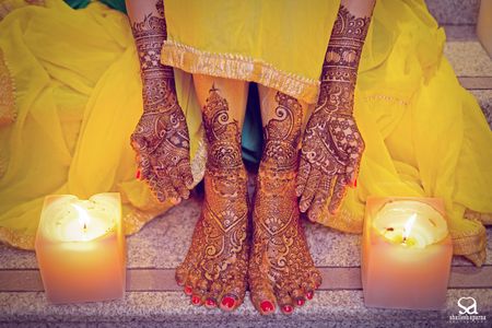 Bridal Mehendi on Hands and Feet with Candles