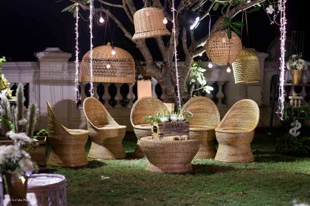 Upturned baskets and cane chairs for outdoor decor.