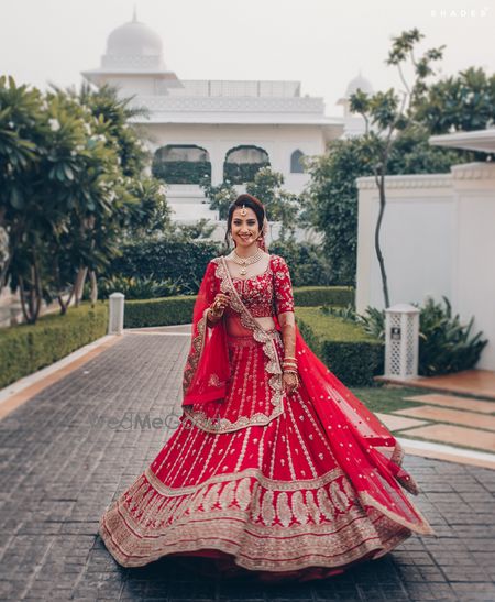 Twirling red lehenga shot